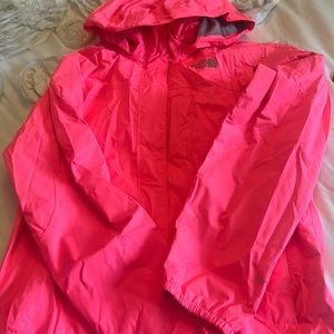 Girl’s pink The North Face raincoat